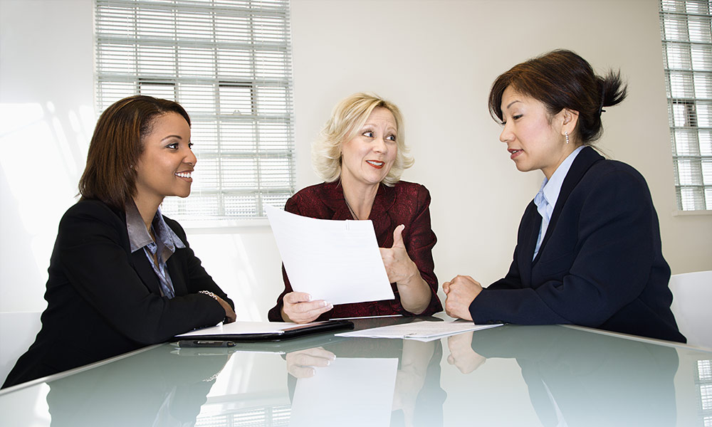 Three people meeting